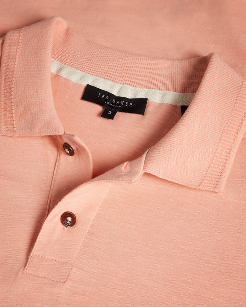 DELVIN-Tops-Dive into DELVIN. This essential polo shirt covers all the bases with a flattering fit, collar, and short sleeves. Paired with jeans and trainers, this top is perfect for spontaneous visits to the farmer's market or can be dressed up with tailored trousers and boots for a smart-casual look. By choosing Ted Baker cotton products, you're supporting our investment in the Better Cotton Initiative's mission. This product is sourced via a system of mass balance and therefore may not contain better cot